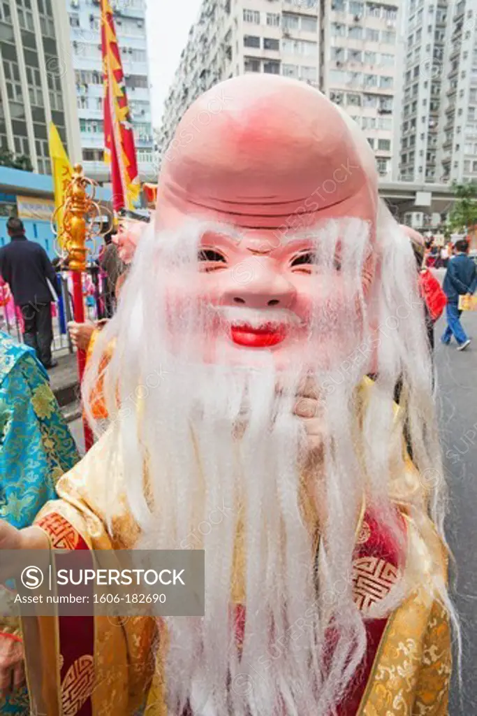 China,Hong Kong,Tai Kok Tsui Temple Fair,Parade Participant Dressed in Lucky God Costume
