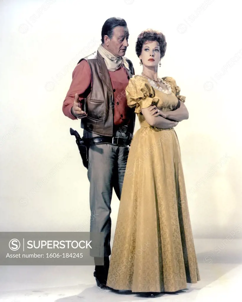 John Wayne and Maureen O'Hara , McLINTOCK ! , 1963 directed byAndrew V. McLaglen (United Artists)