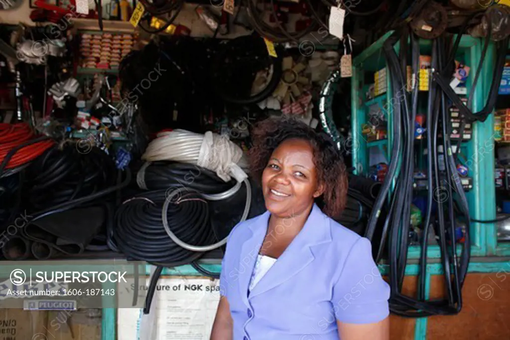 Jane Ruguru owns a hardware store financed by loans from BIMAS microcredit. She has been a client for 10 years and is now servicing a loan of 8 million Kenyan shillings Embu. Kenya.