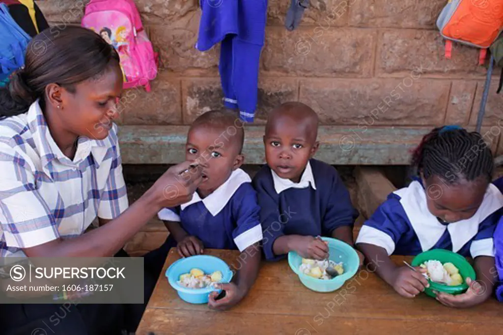 Meal in a kindergarten financed by a 25,000 KS loan from Opportunity microfinance. Nairobi. Kenya.