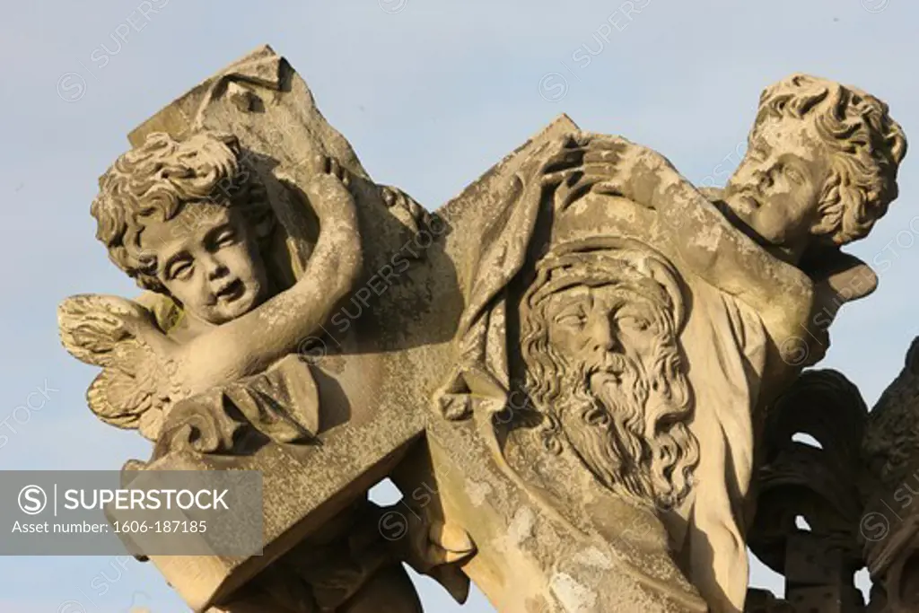 Religious sculpture on Charles bridge. Praha. Czech Republic.