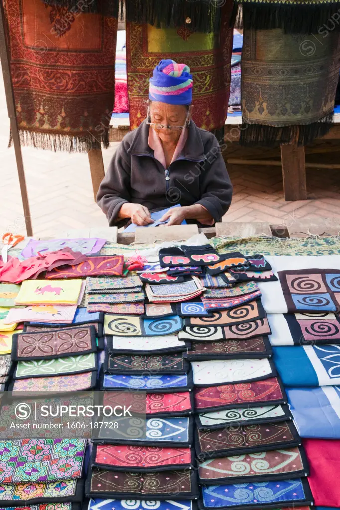 Laos,Luang Prabang,Ethnic Craft Night Market,Hilltribe Woman Selling Silk Purses