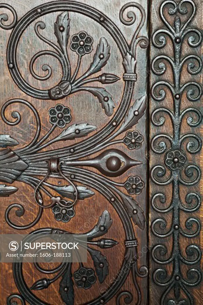 England,Cambridgeshire,Ely,Ely Cathedral,Ornate Ironwork Pattern on Wooden Doorway