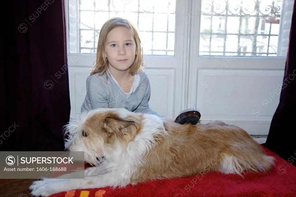 6-year-old girl with a dog