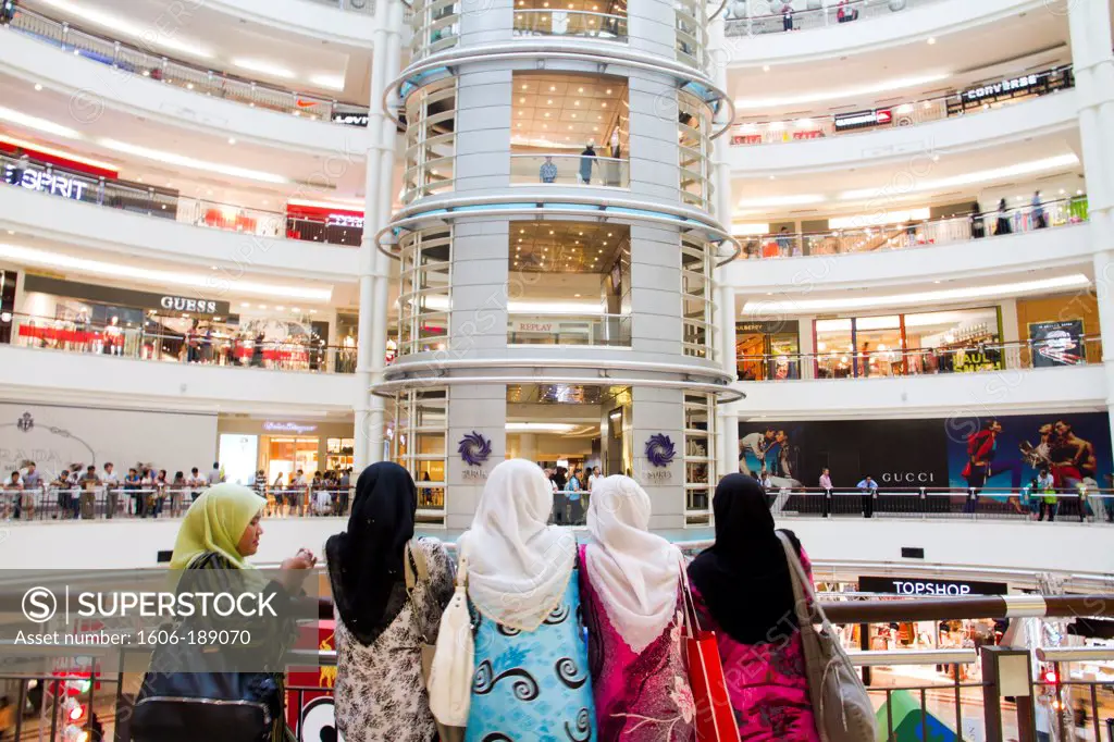 Malaysia, Kuala Lumpur, Suria KLCC shopping center inside Petronas Towers, group of women