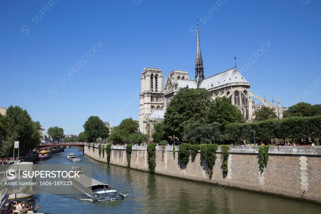 France, Paris, Notre Dame and Barges on the River Seine