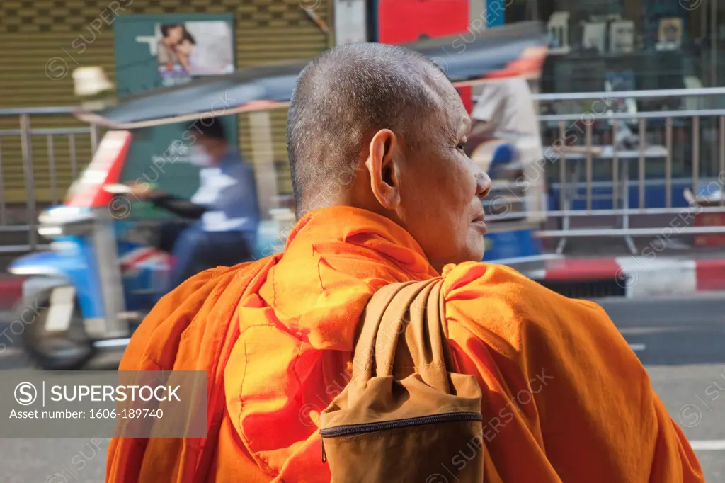Thailand, Bangkok, Chinatown, Monk Standing by Side Road