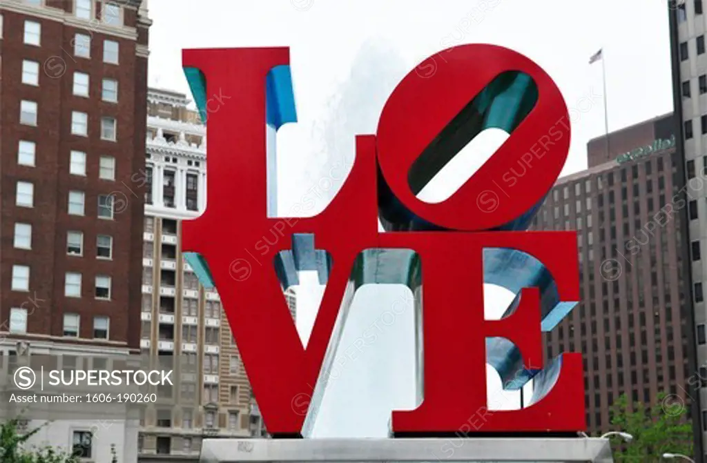 United States,USA,Pennsylvania,Philadelphia. The landmark ""Love"" sculpture by Robert Indiana,with the Love Fountain spouting behind it