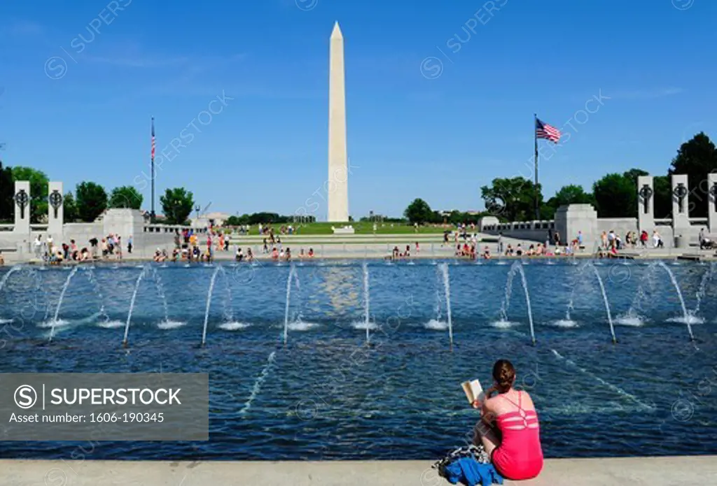 The World War II Memorial in Washington DC on the National Mall with the Washington monument in the background