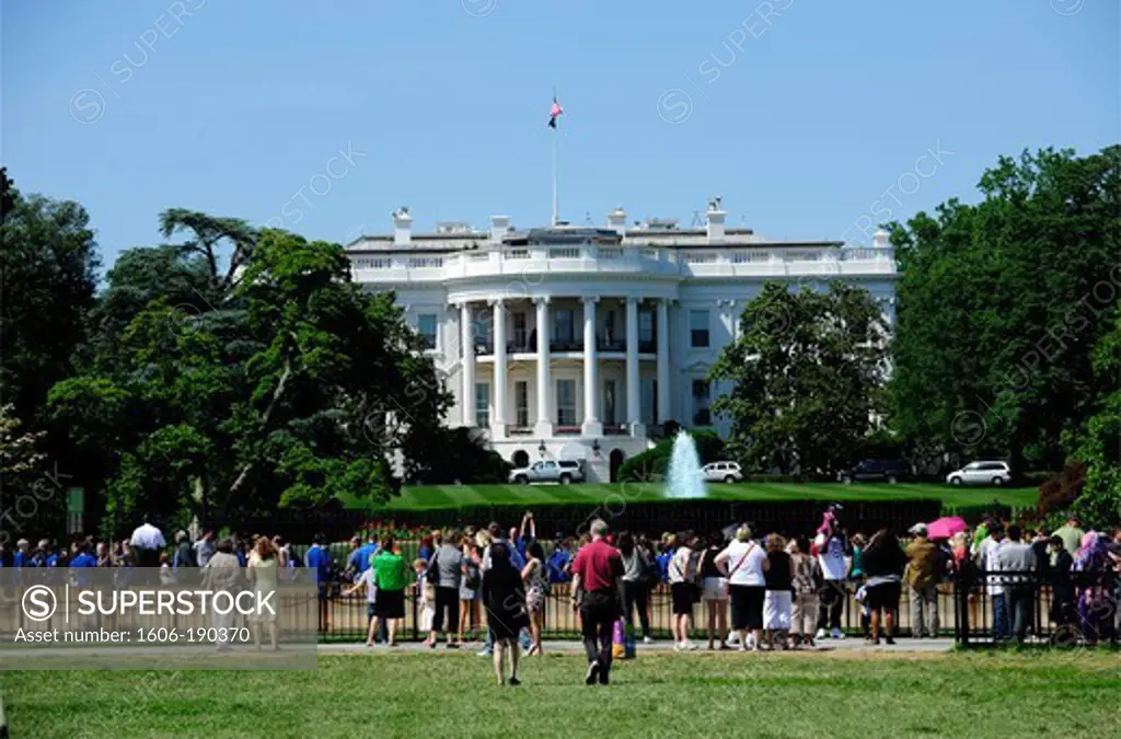 White house,Iconic residence of the sitting President of the United States,an unrecognizable Secret Service Agent watches from the roof,Washington DC,United States,USA