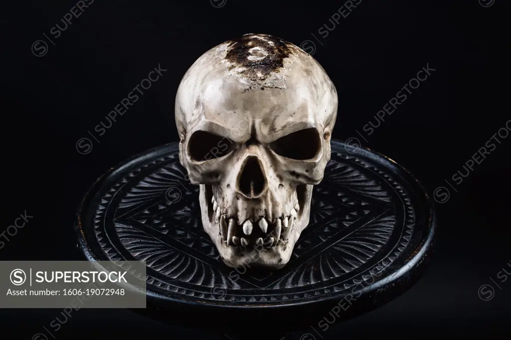 Scene shot with a scary skull on a black background