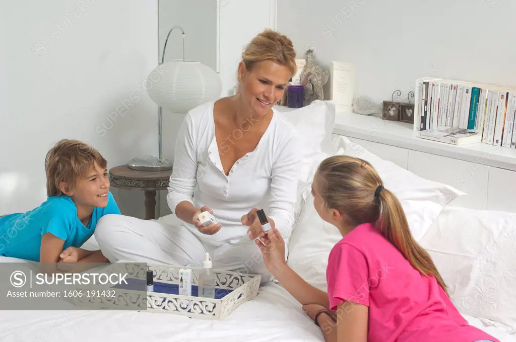 Caucasian woman with her children looking for herbal medecine