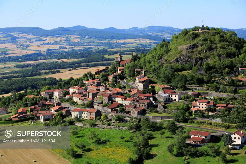 France, Puy-de-Dôme (63), Usson village perched on its volcanic peak, overlooking the Allier valley, it is labeled one of The Most beautiful villages of France (aerial photo)