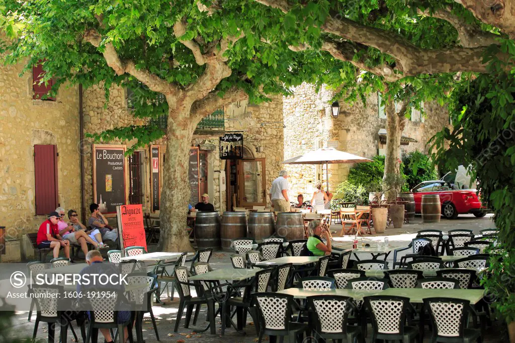 France, Gard (30), Aiguèze, the village is perched on a cliff overlooking the Ardèche, it is labeled one of the Most beautiful villages of France, café terraces