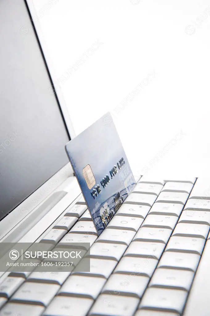 Visa Card On A Laptop Keyboard