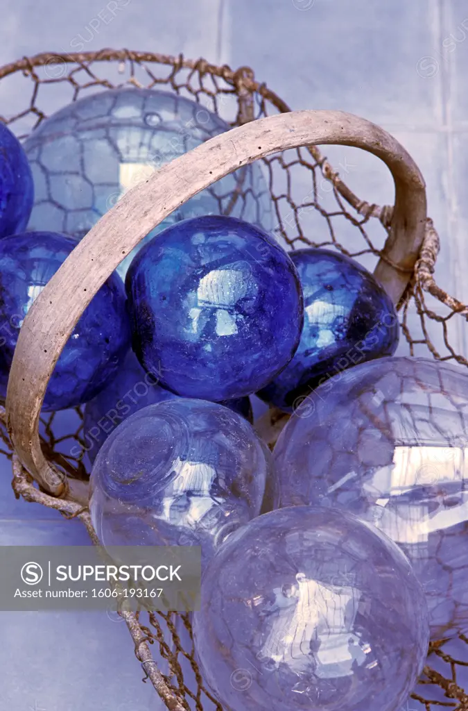 Blue Glass Balls In A Basket