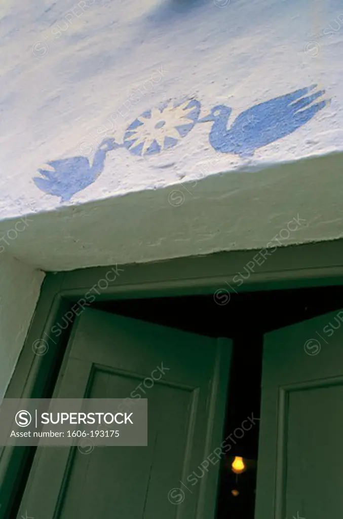Greece, Serifos Island, Lintel Of  A House Painted With Two Blue Birds And Sun-Like Flower