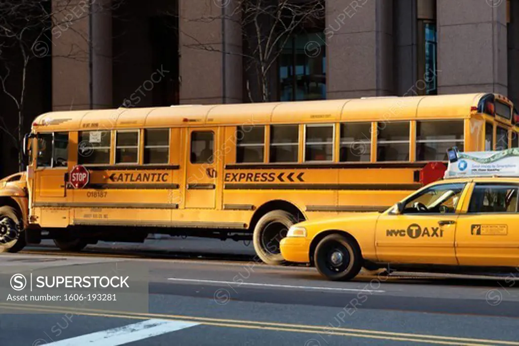 USA, New York City, Yellow Bus And Taxi