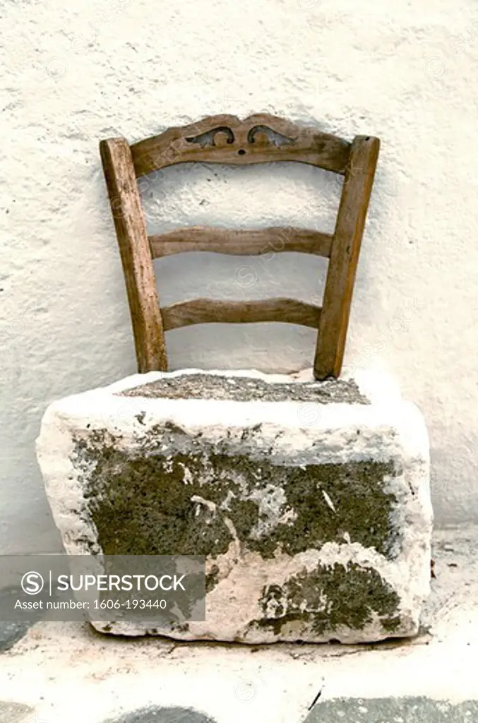 Greece, Serifos Island, Home Made Chair Created With A Stone And A Wooden Dossier