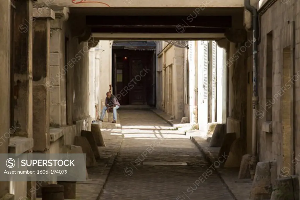 France, Paris, Man In An Alleyway (4Th Arrondissement)