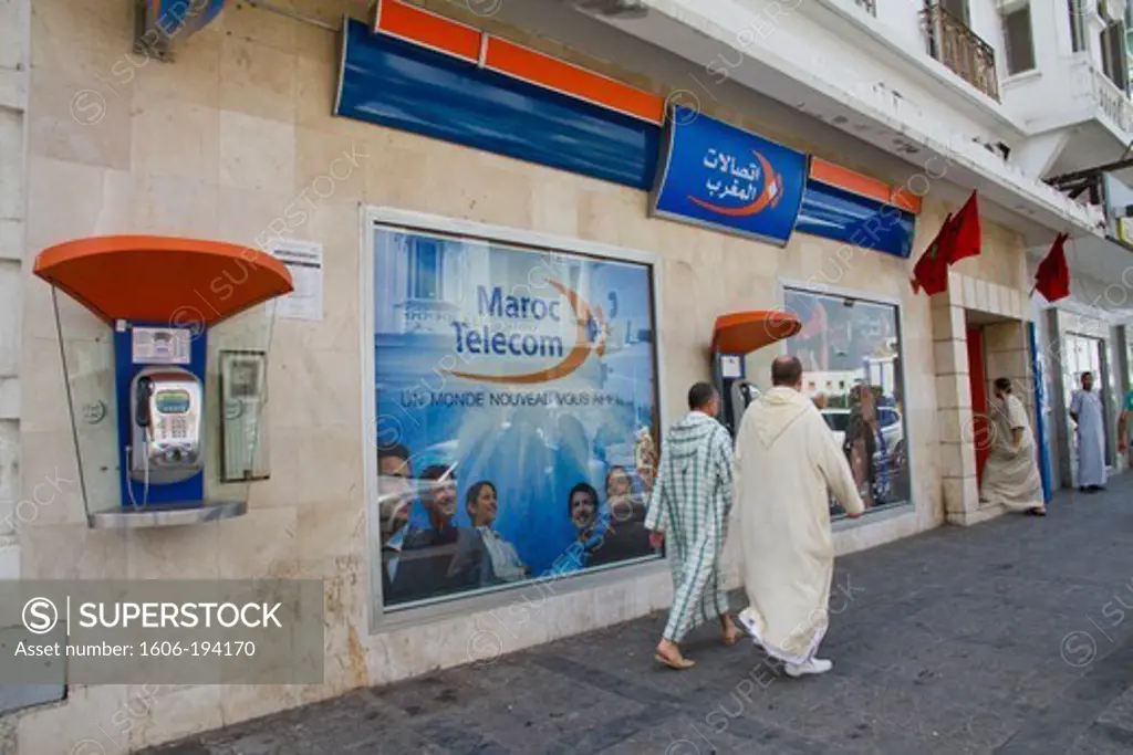 Morocco, Tanger. Men In Front Of Maroc Telcom Store