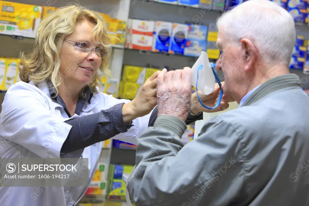 France, Drugstore, Pharmacist With A Customer