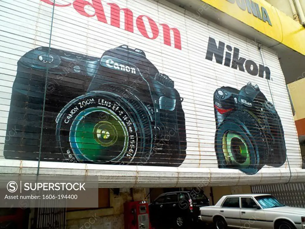 Malaysia, Borneo, Kota Kinabalu, Giant Nikon And Canon Advertising Paintings For A Photography Shop
