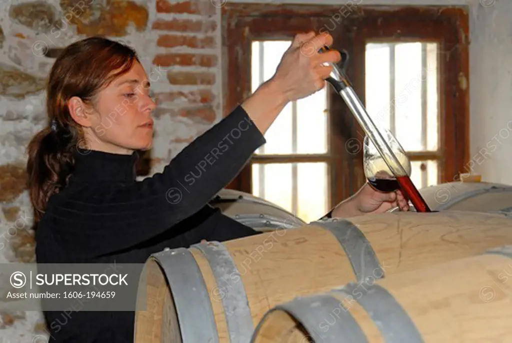 France, Herault Department, A Woman Testing Wine