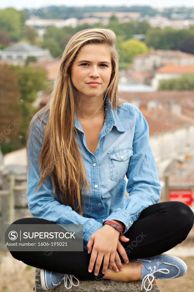 Caucasian Teenager Girl Looking At The Photographer