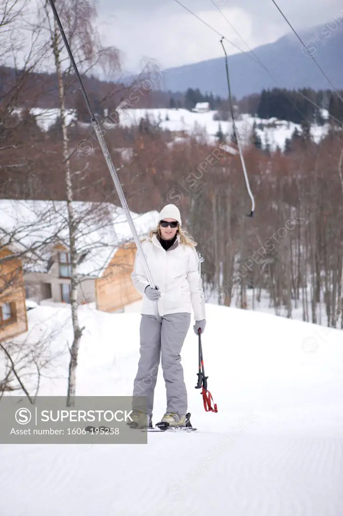 France, Winter Woman Portrait On A Ski Lift