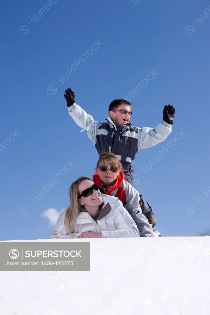 France, Winter Family On The Snow