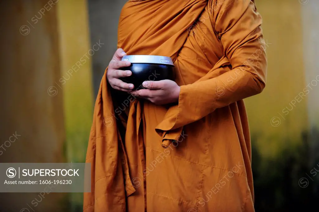 Monk With Alms Bowl Waiting For Alms In Hoi An, Central Vietnam, Vietnam, South East Asia, Asia