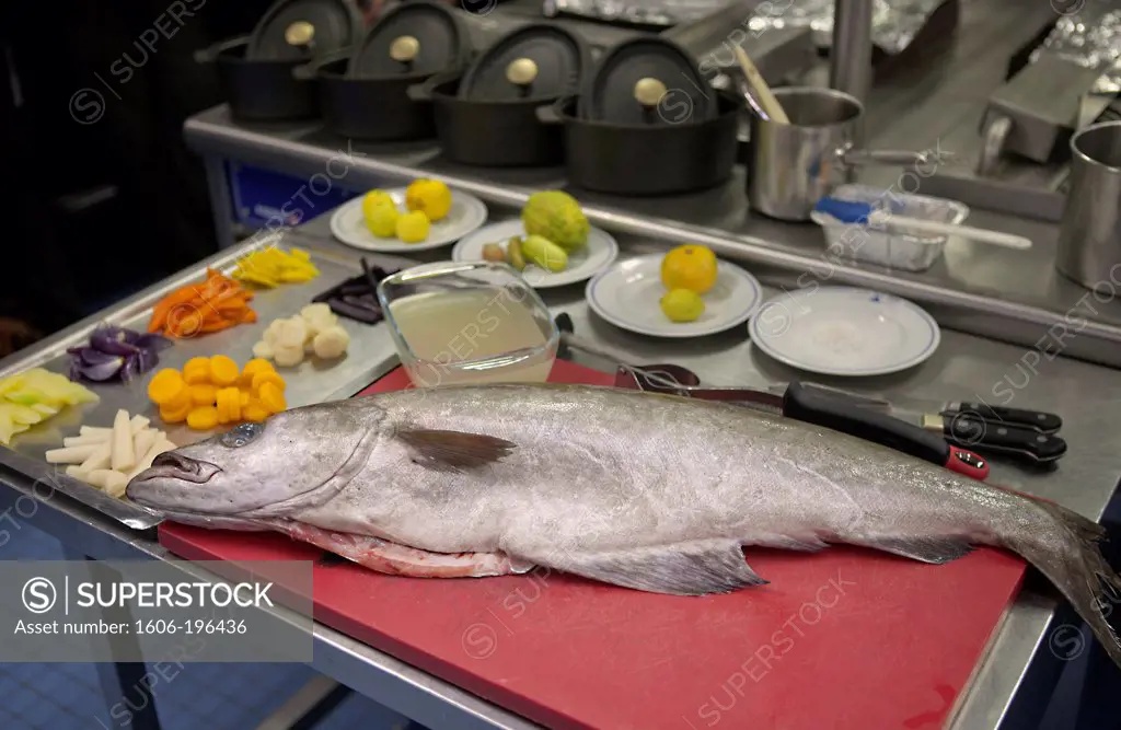 France, Paris, Close Up Of Peeled Vegetables And A Coalfish In A Kitchen