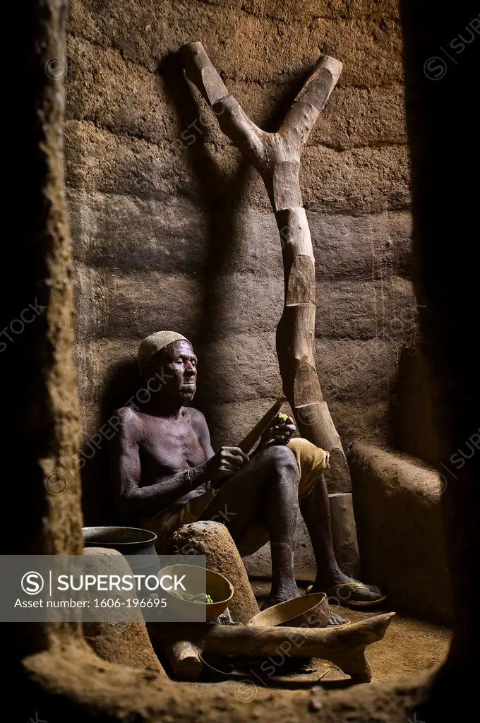 Benin, Atacora County, Koutagou, Bago Unkui Cooking In The Kitchen Of A Tata Somba, Typical Defensive Storeyed House Of The Northern Benin