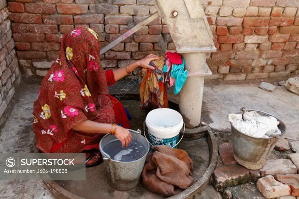 Woman Doing Laundry . Mathurai. India.