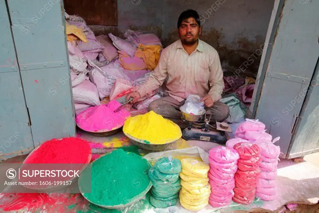 Man Selling Colored Powders For Holi Festival