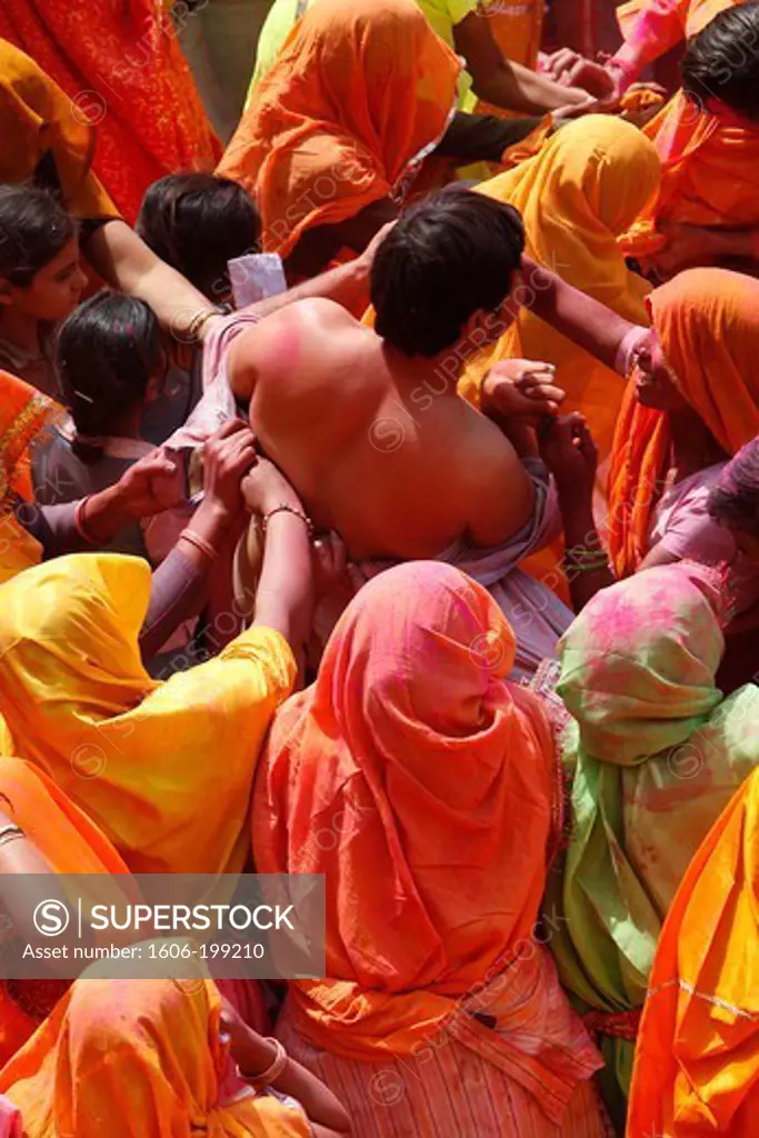 During Holi, Social Conventions Are Put Aside. On Huranga, The Concluding Part Of Holi Festival At Dauji Temple, Men And Women Reenact The Beating Of Balaram, God Krishna'S Older Brother Balaram, Krishna Once Wanted To Dance With The Gopies As Kris ...