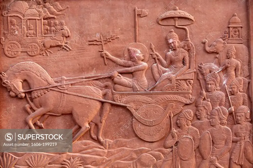 Bhagavad Gita Engraved On A Hindu Temple, Krishna Driving Arjuna'S Chariot Vrindavan. India.