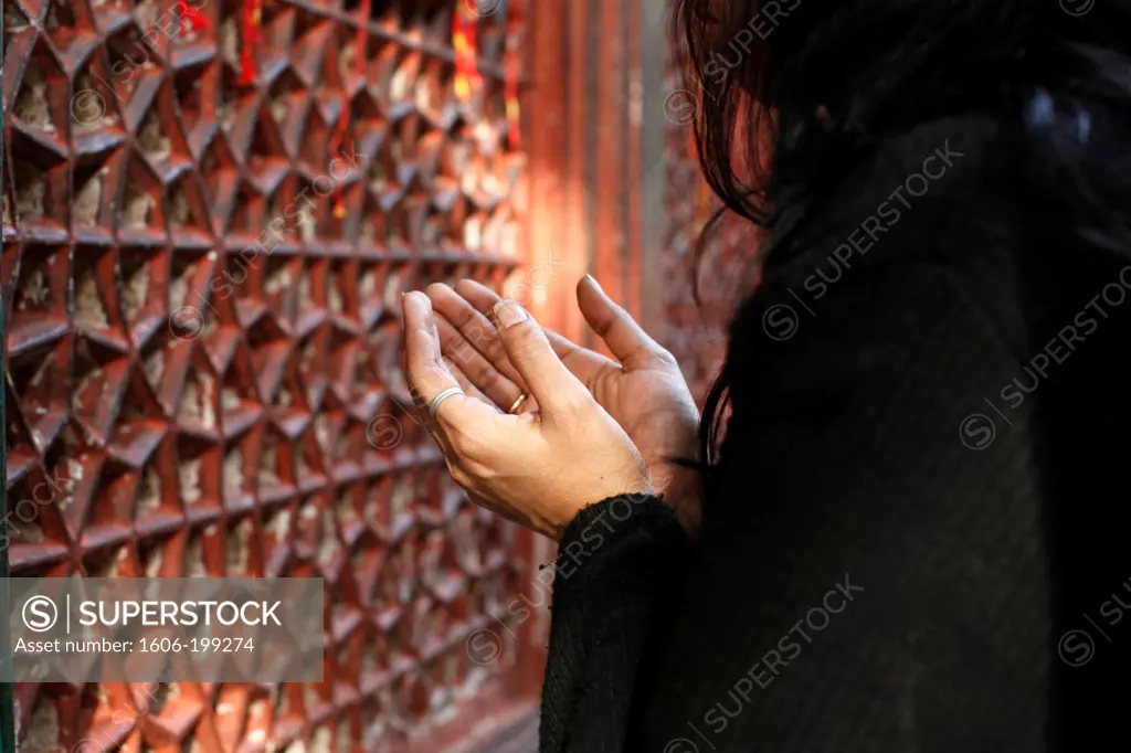 Woman Praying Outside A Mausoleum In Nizamuddin Dargah Complex Delhi. India.