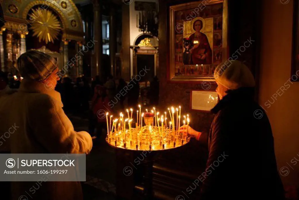 Kazan Cathedral. Russian Orthodox Believers Lights Candles. Saint Petersburg. Russia.