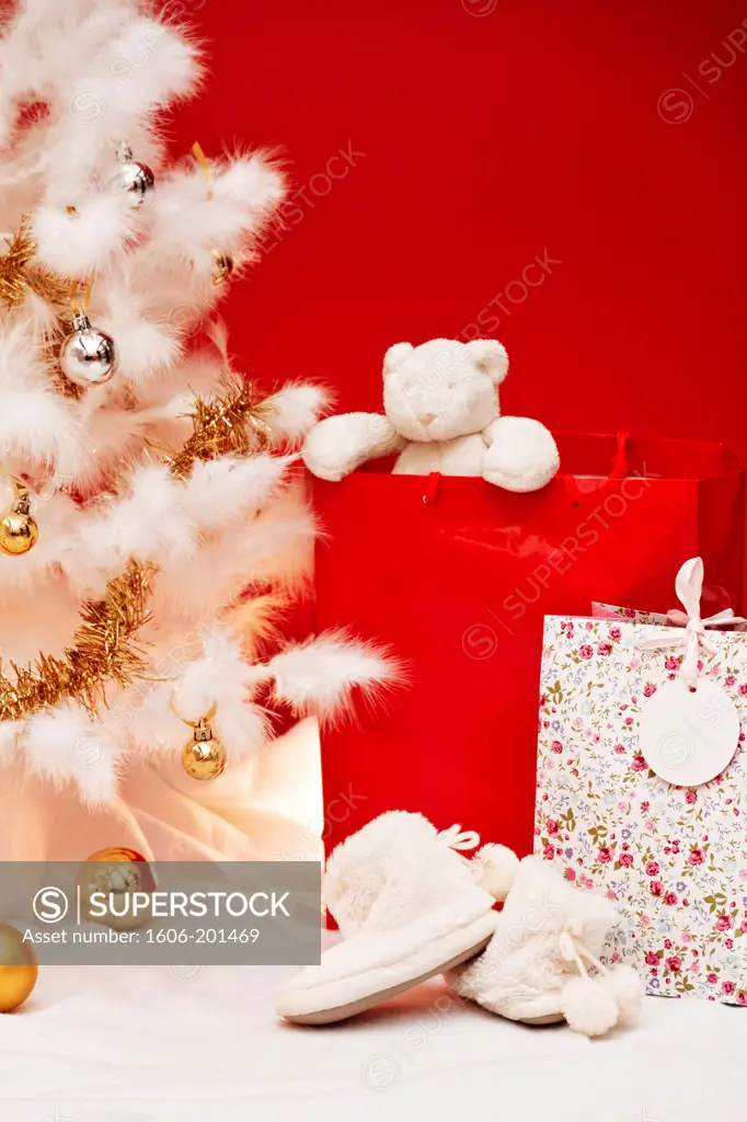 Still, Shoes And Gifts Beside A Christmas Tree