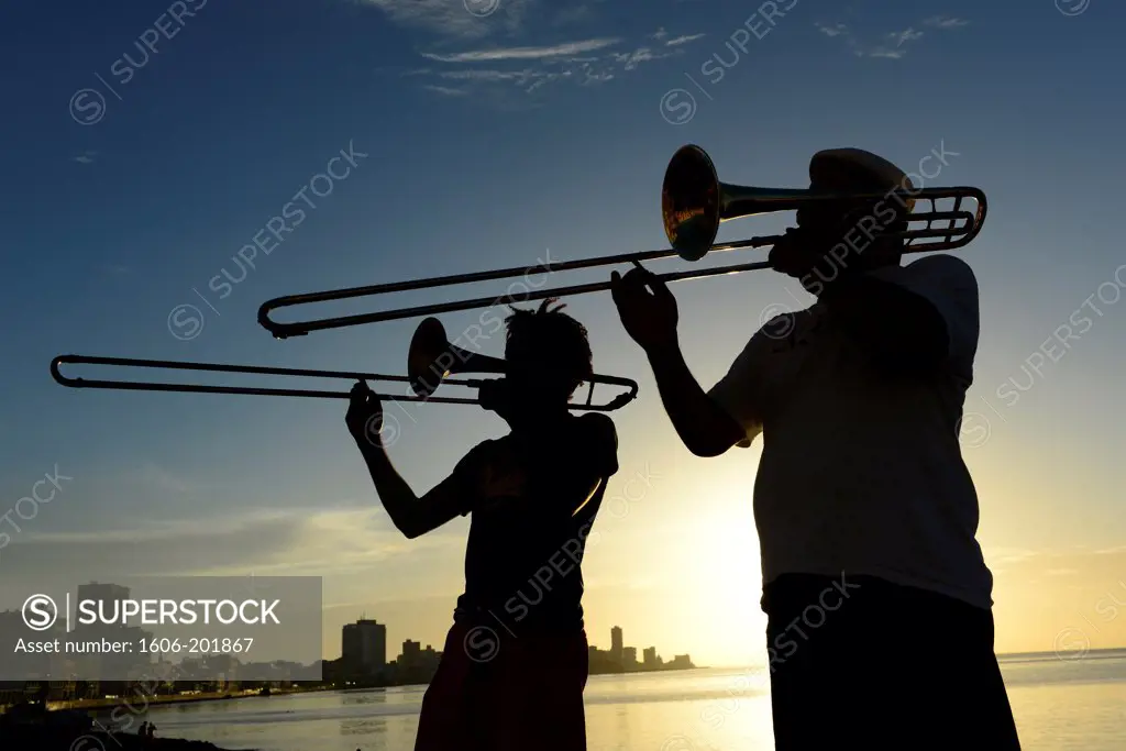 Two Men Playing Trumpet At The Malecon In Havana, Cuba