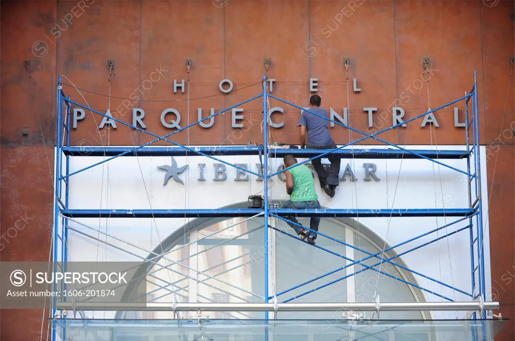 Workers On Scaffoding In The Entrance Of Iberia Parque Central Hotel