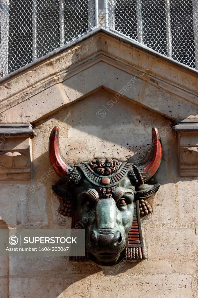 France, Paris, 4E, Marais District, Foreground On A Sculpture At The Effigy Of A Bronze Bull Head On A Wall Of The Ancient Blancs Manteaux Market