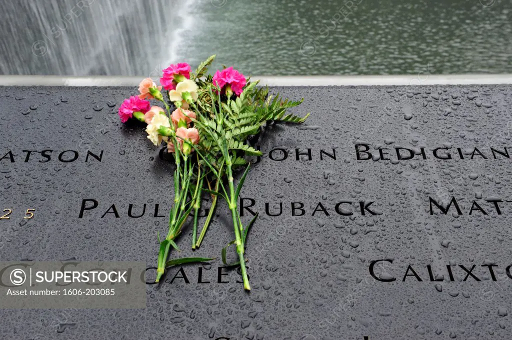 Flowers On The National September 11 Memorial (9/11 Memorial) Monument With Engraved Names Of Over 3.000 Victims Killed In The Attacks On Twin Towers On September 11, 2001 In New York City, New York State, United State, Usa
