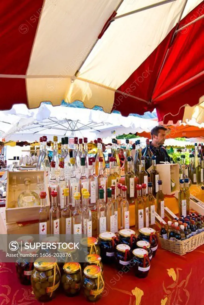 France, Alpes-de-Haute-Provence, Ubaye Valley, Barcelonnette, the Million-Rousseau family from Méolans-Revel sells liquors and marmelades made with local plants at the market