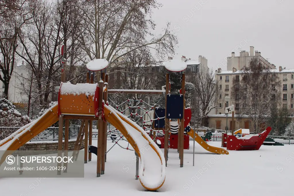 FRANCE, Paris, 10th arr, Verdun public square, playground on a snowy day