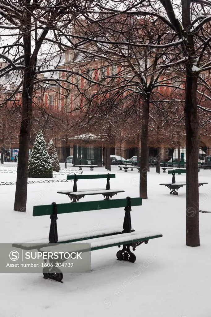 France, Paris, 3rd-4th districts, Place des Vosges, Public benches covered in snow