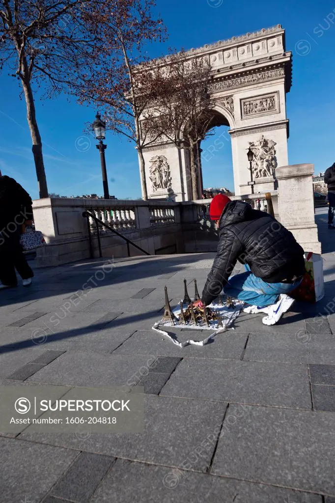France, Paris, Triumphal Arc, street peddler