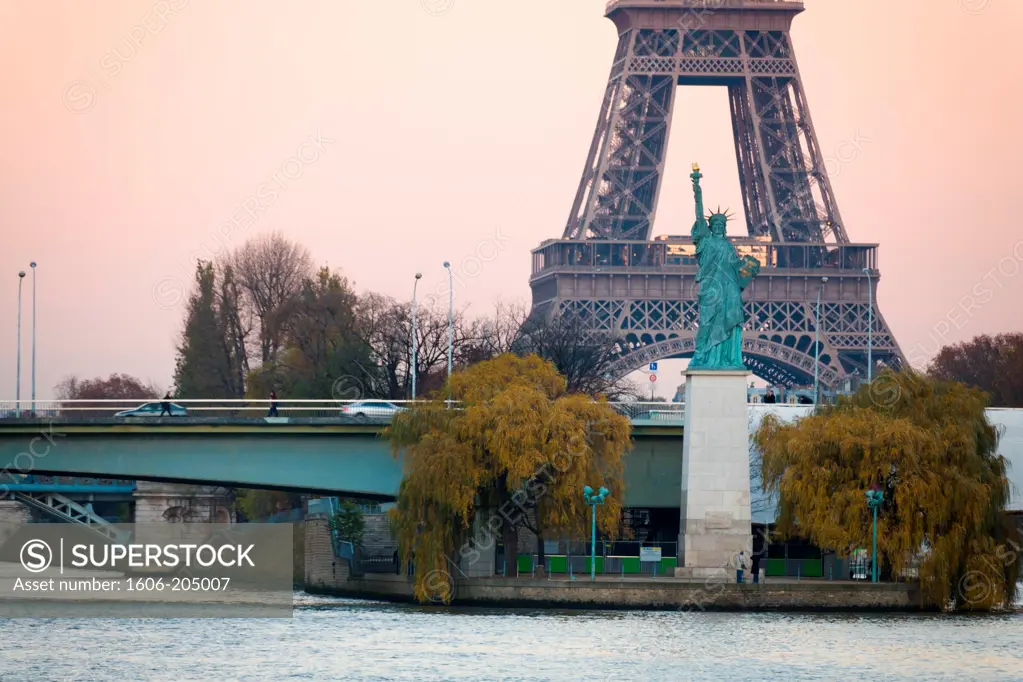 France. Paris. 16th district. The French Statue of Liberty, the Eiffel Tower in the background